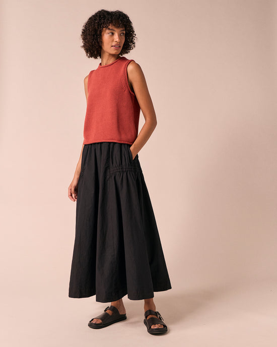 model wears willow black poplin skirt