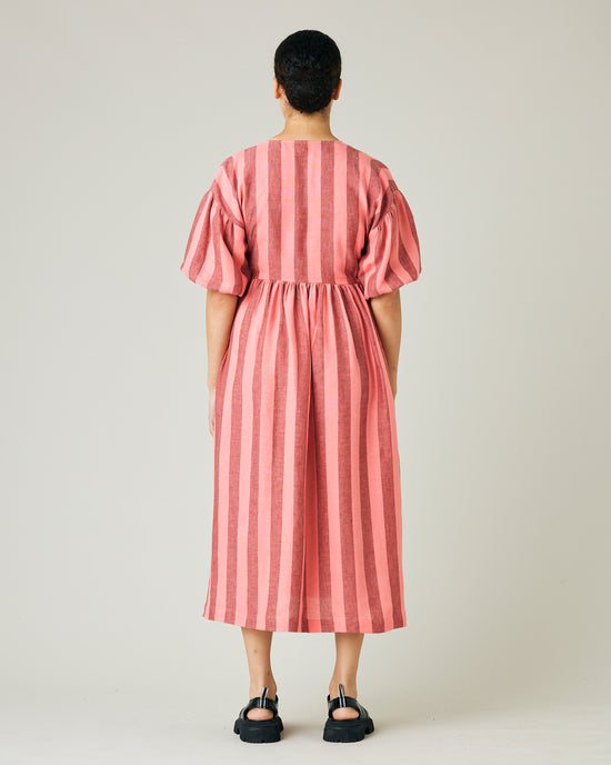 model wears blush stripe linen winnie dress