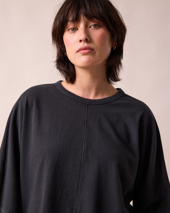 model wears yuna black jersey top