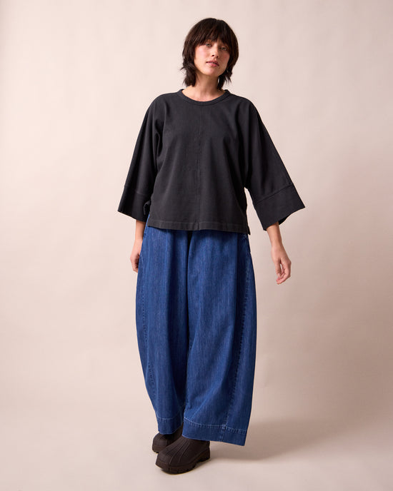 model wears yuna black jersey top