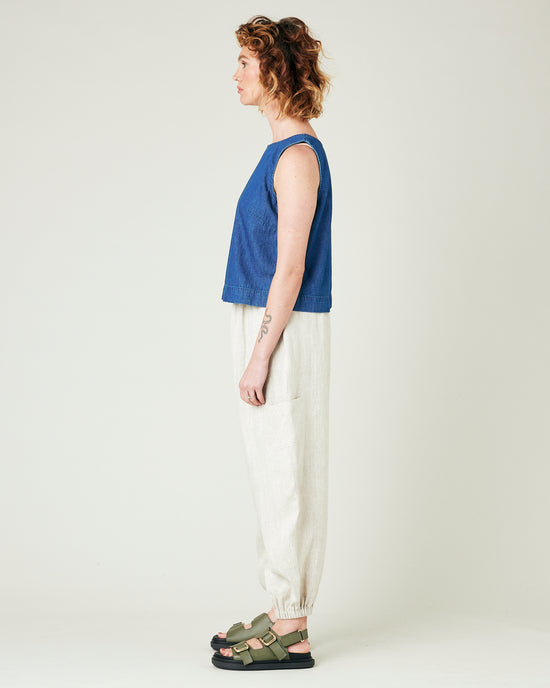 model wears natural linen yoli trousers