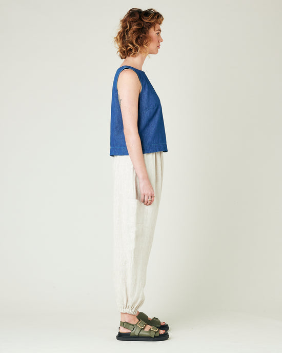 model wears natural linen yoli trousers