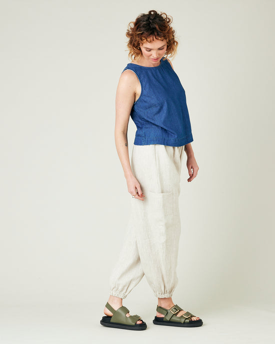 model wears natural linen yoli trousers