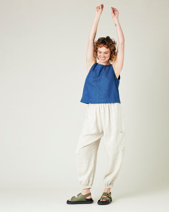 model wears natural linen yoli trousers