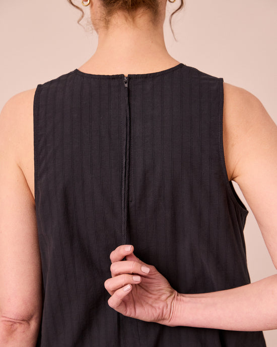 model wears zena black self stripe cotton dress
