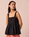 model wears zuri black cotton poplin top