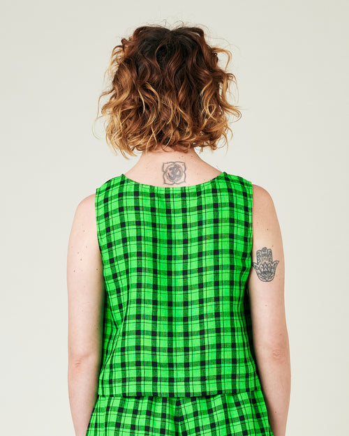 model wears green check linen esme top