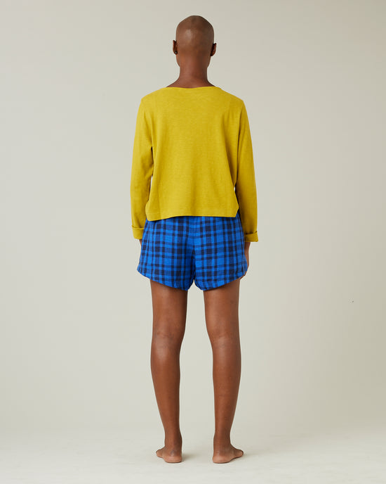 model wears indigo check bed shorts