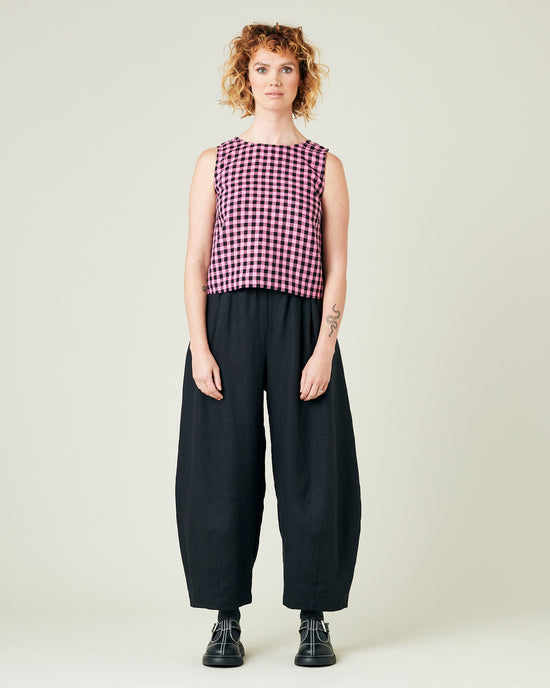 model wears black daisy linen trousers 