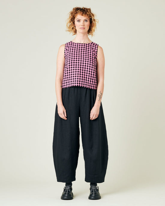 model wears black daisy linen trousers