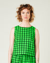 model wears green check linen esme top