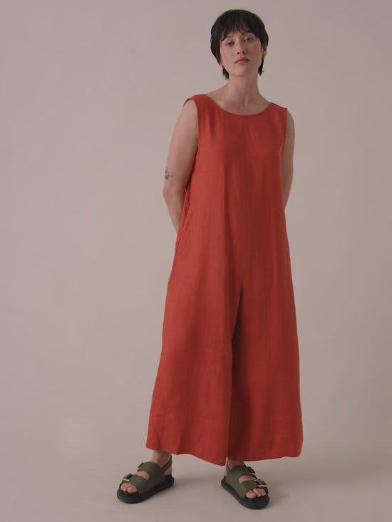 model wears vivienne burnt orange linen jumpsuit
