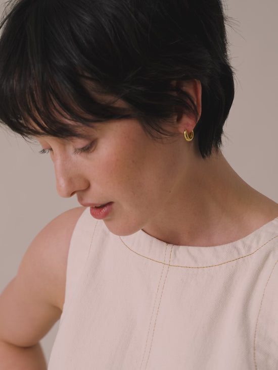 model wears hailey ecru denim top and talia ganache gingham cotton linen skirt 