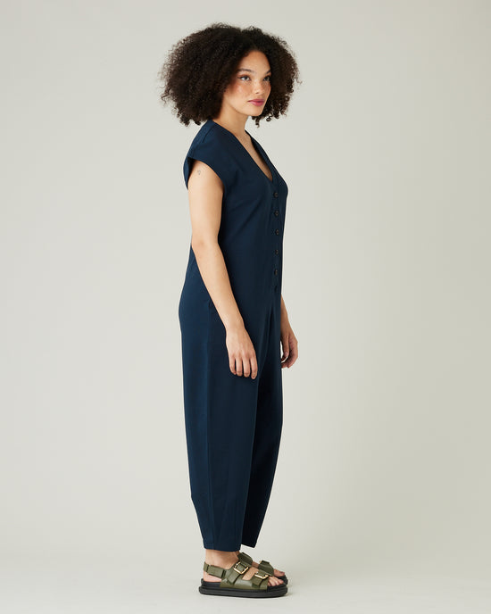 model wears navy jersey frankie jumpsuit