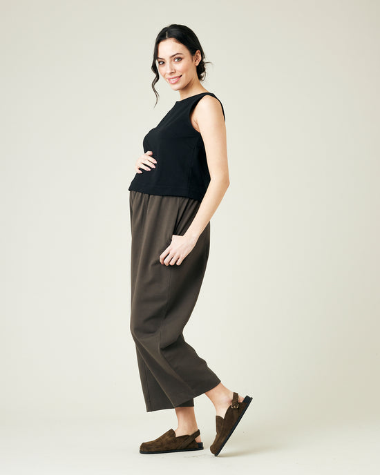 pregnant model wears espresso jersey mabel trousers