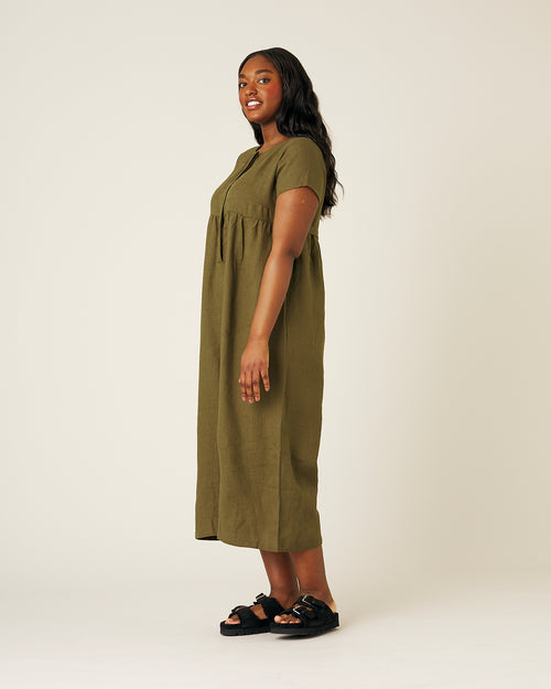 model wears khaki sahara jumpsuit