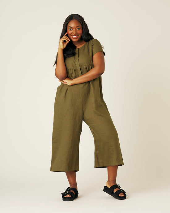 model wears khaki sahara jumpsuit