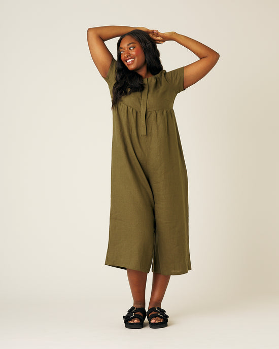 model wears khaki sahara jumpsuit