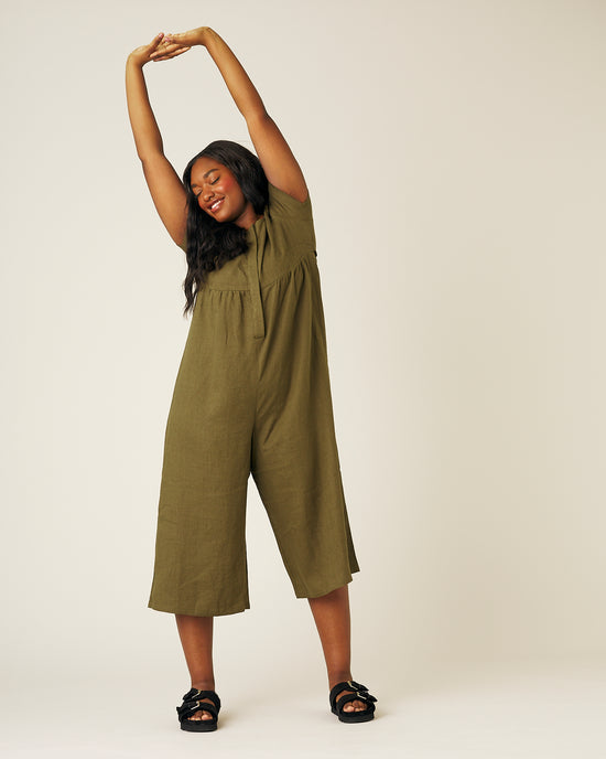 model wears khaki sahara jumpsuit