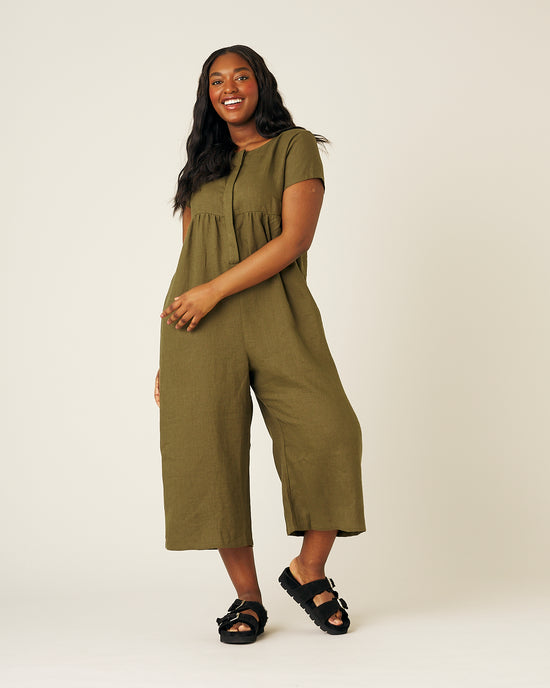 model wears khaki sahara jumpsuit