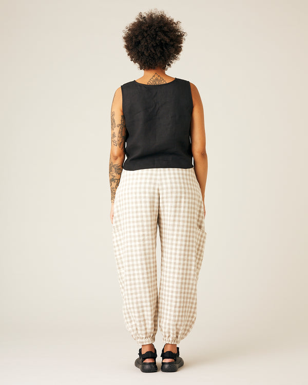 pregnant model wears black linen esme top