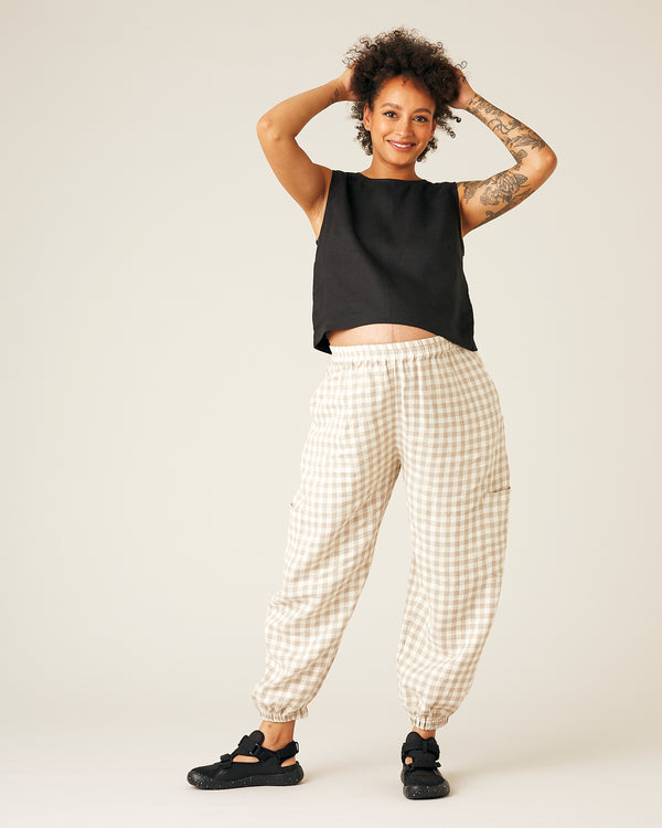 pregnant model wears black linen esme top