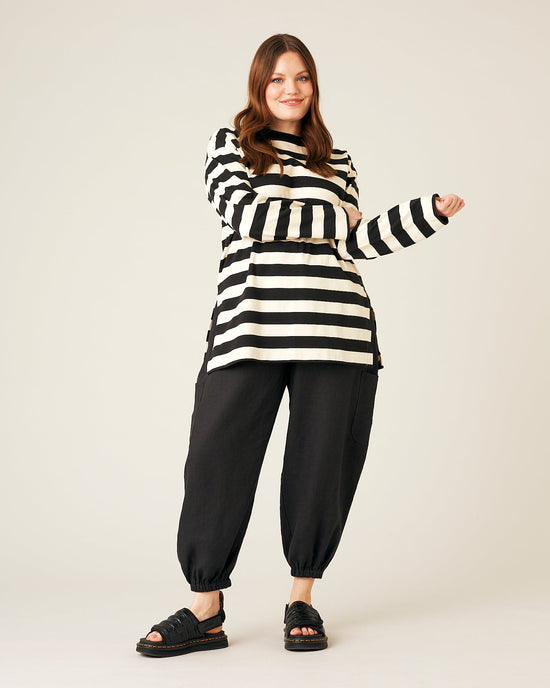 model wears black linen yoli trousers