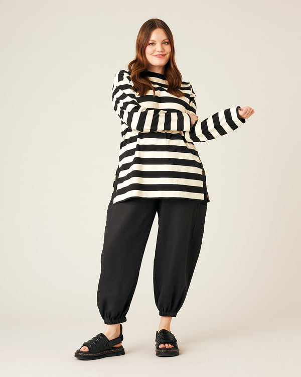 model wears black linen yoli trousers