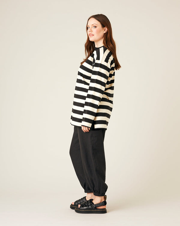 model wears black linen yoli trousers