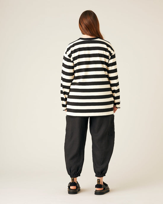 model wears black linen yoli trousers