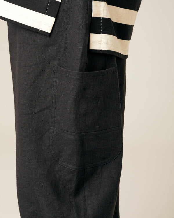 model wears black linen yoli trousers