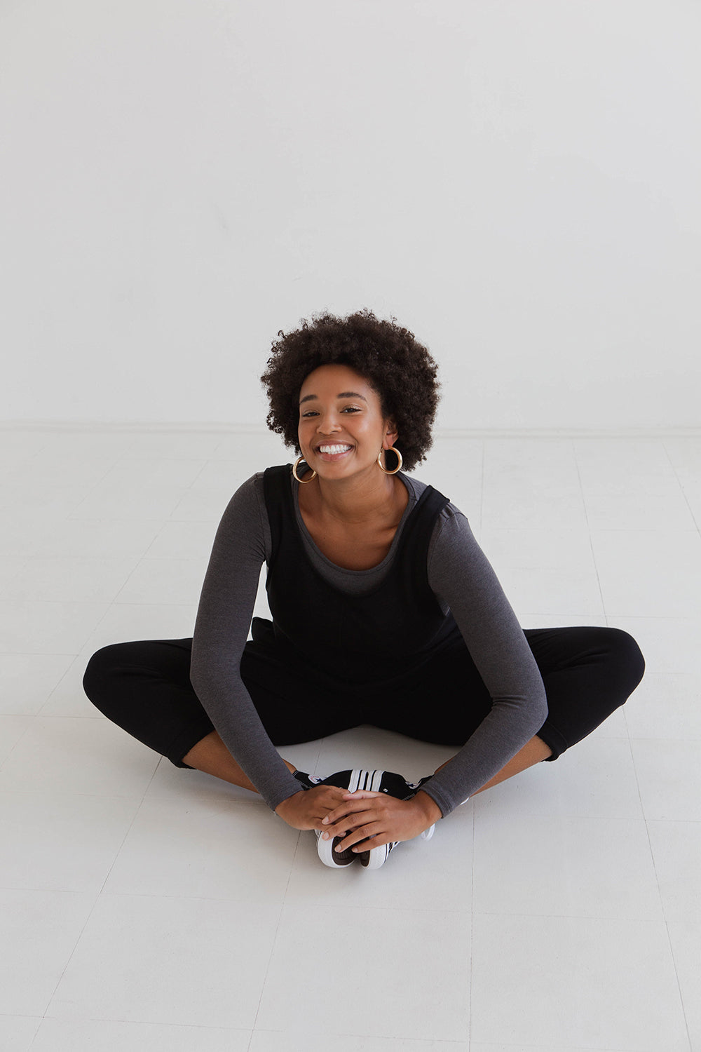 model wears black laura jumpsuit