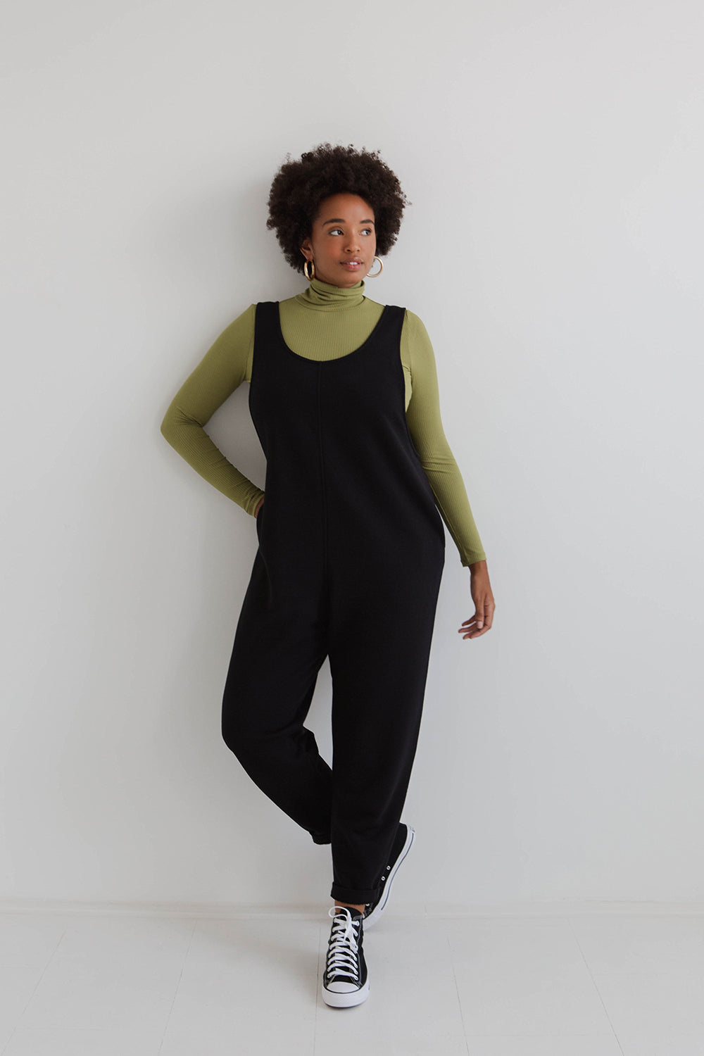 model wears black laura jumpsuit