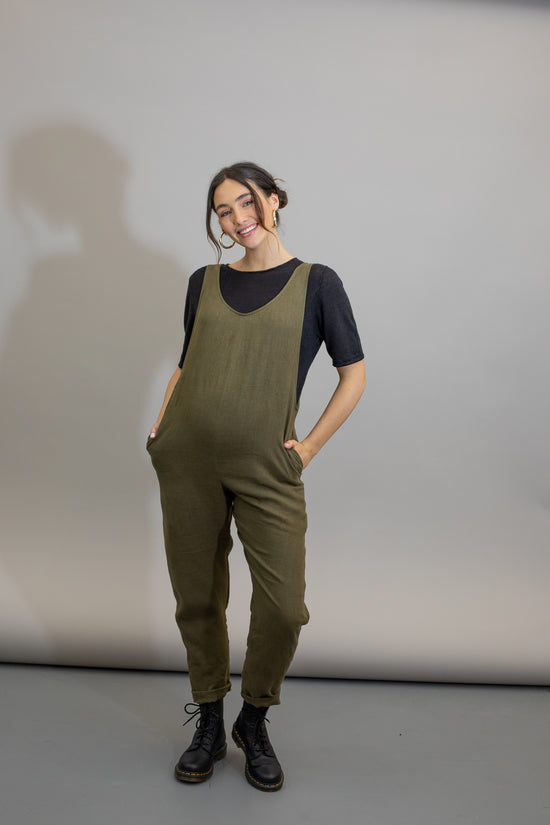 pregnant model wears khaki linen laura jumpsuit