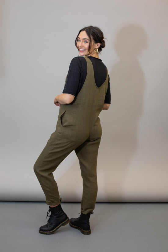 pregnant model wears khaki linen laura jumpsuit