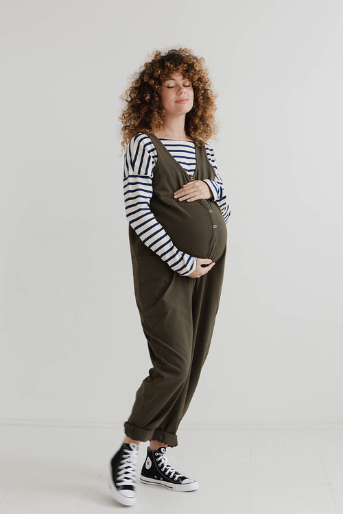 pregnant model wears olive jersey poppy jumpsuit