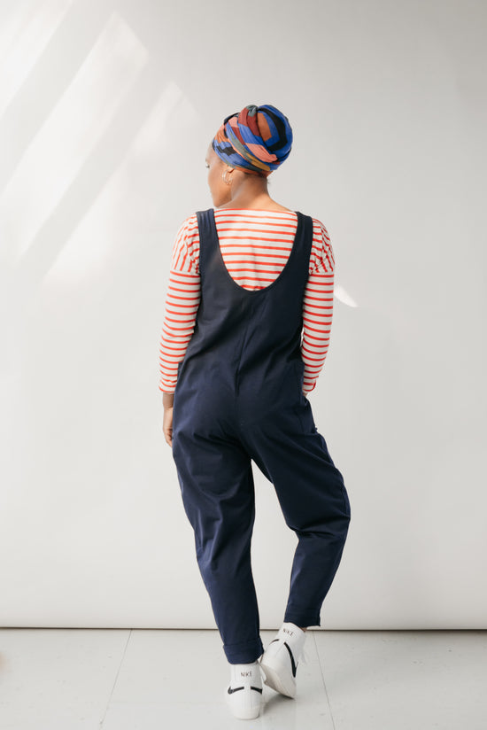 model wears might ight navy jersey poppy jumpsuit