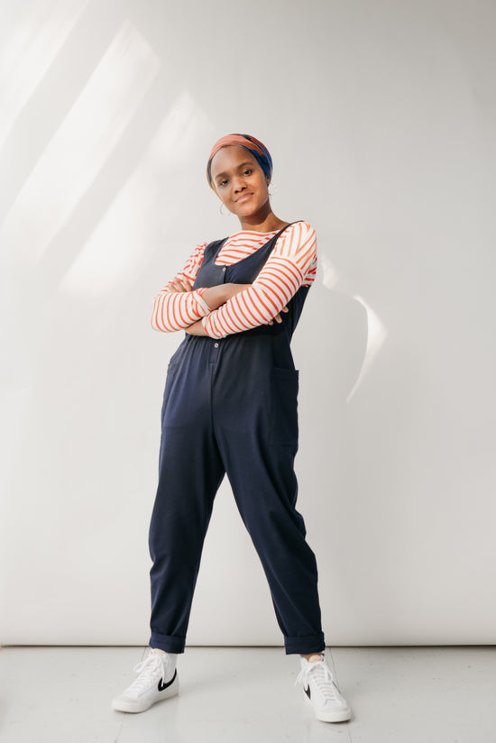 model wears might ight navy jersey poppy jumpsuit