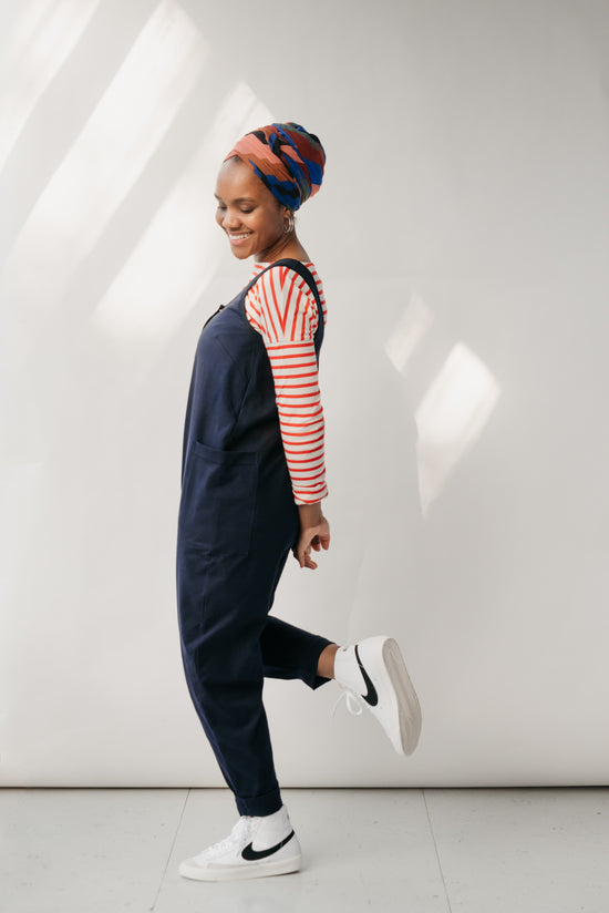 model wears might ight navy jersey poppy jumpsuit