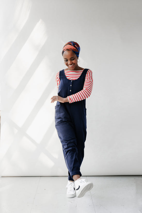 model wears might ight navy jersey poppy jumpsuit