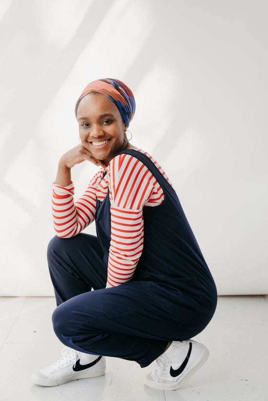 model wears might ight navy jersey poppy jumpsuit